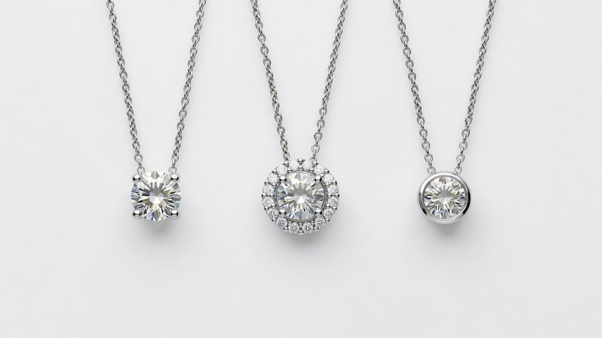 Three moissanite pendant styles displayed side by side showing solitaire halo and bezel set designs on delicate chains