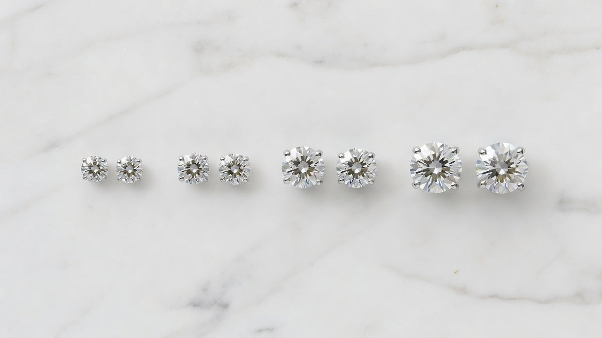Moissanite stud earrings size comparison from 0.5ct to 2ct — Oglowa